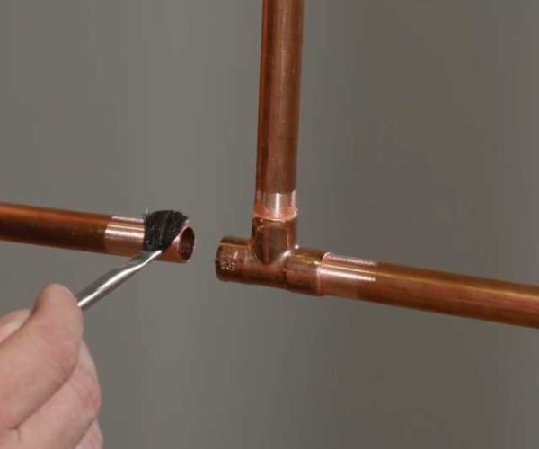 Compuesto para juntas de tuberías con partículas de cobre